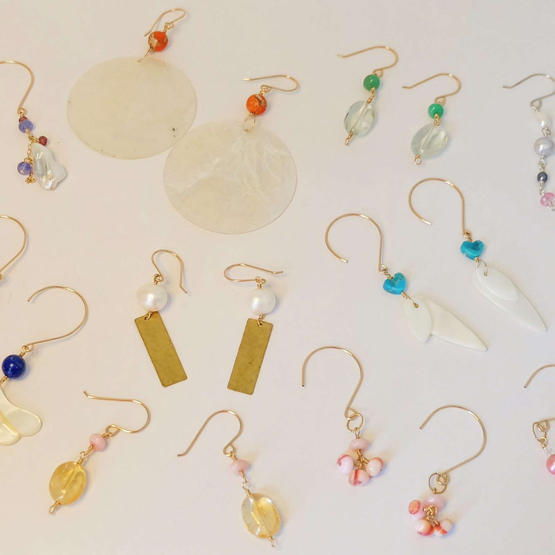 Elegant dangle earrings handcrafted in gold, silver, and gemstones, featuring threaders and drop designs perfect for everyday and special occasions.