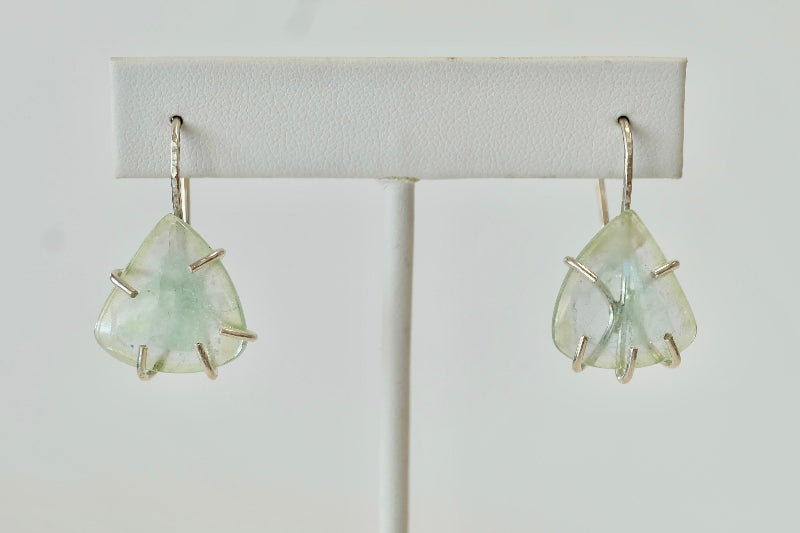 Pair of Aquamarine Dangle Earrings earrings on a white background