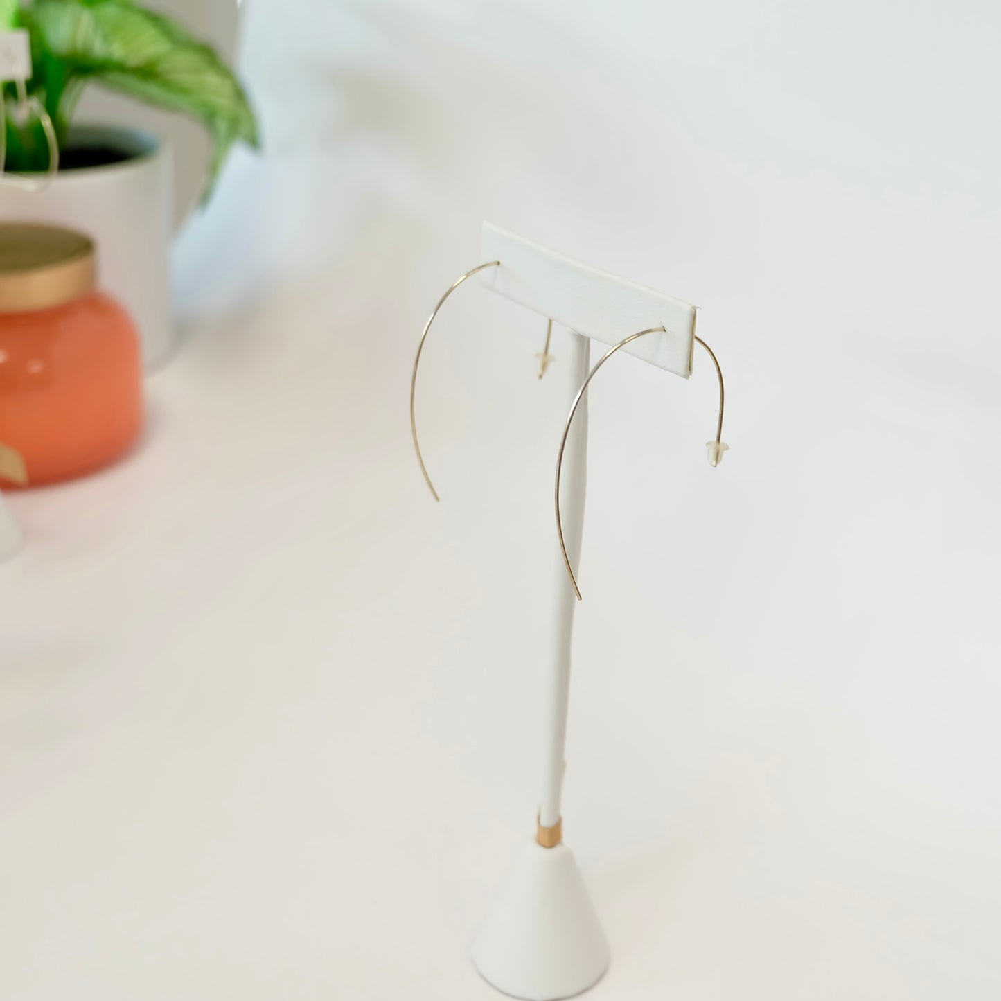 Unique wire threader earrings that combine simplicity and style, making them a versatile addition to any jewelry collection.