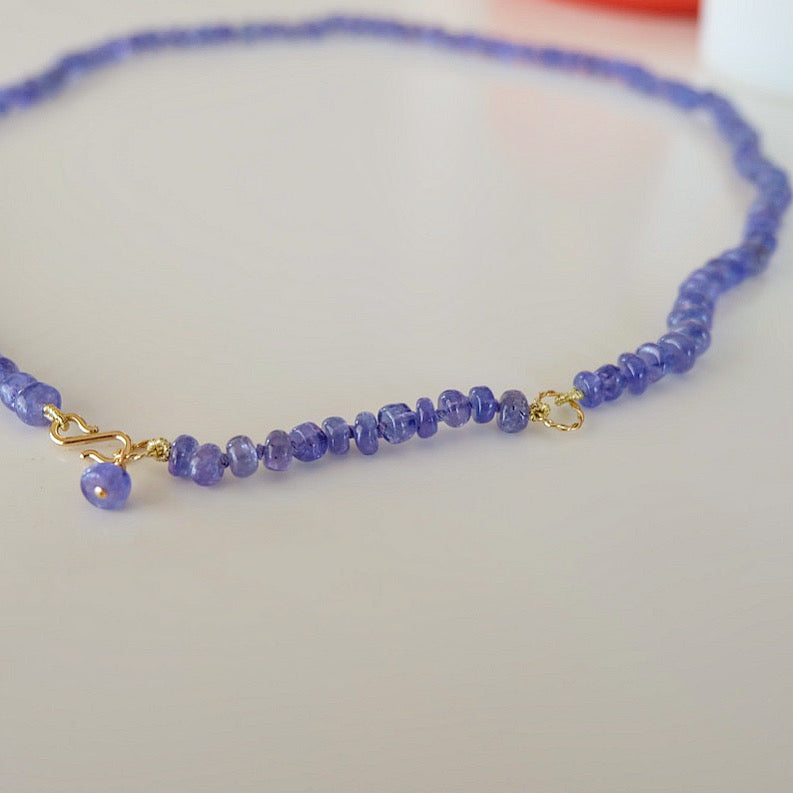 Chic tanzanite tennis necklace featuring a seamless arrangement of vibrant stones, ideal for special events or everyday wear.