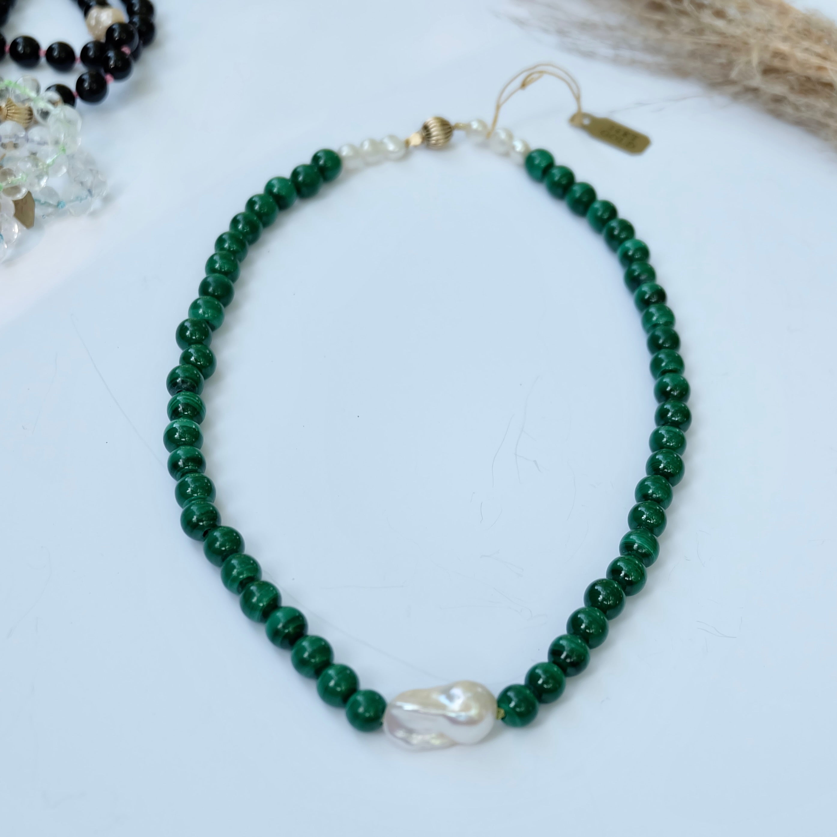 Malachite Pearl Necklace displayed on white background.