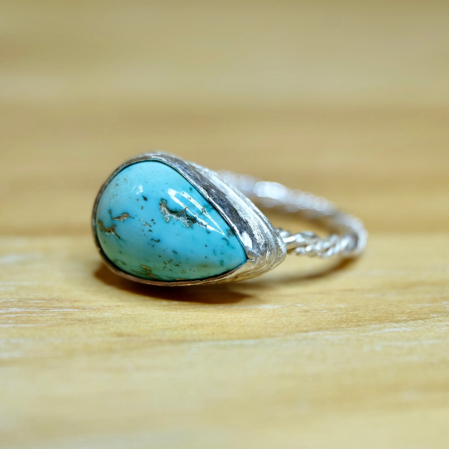 Pear shaped ring with turquoise artisan-crafted in ethically sourced silver