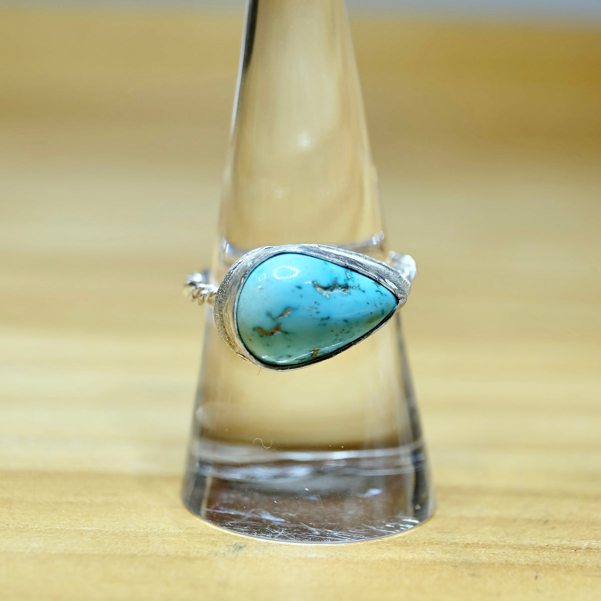 Pear shaped ring with turquoise one-of-a-kind in sterling silver bezel