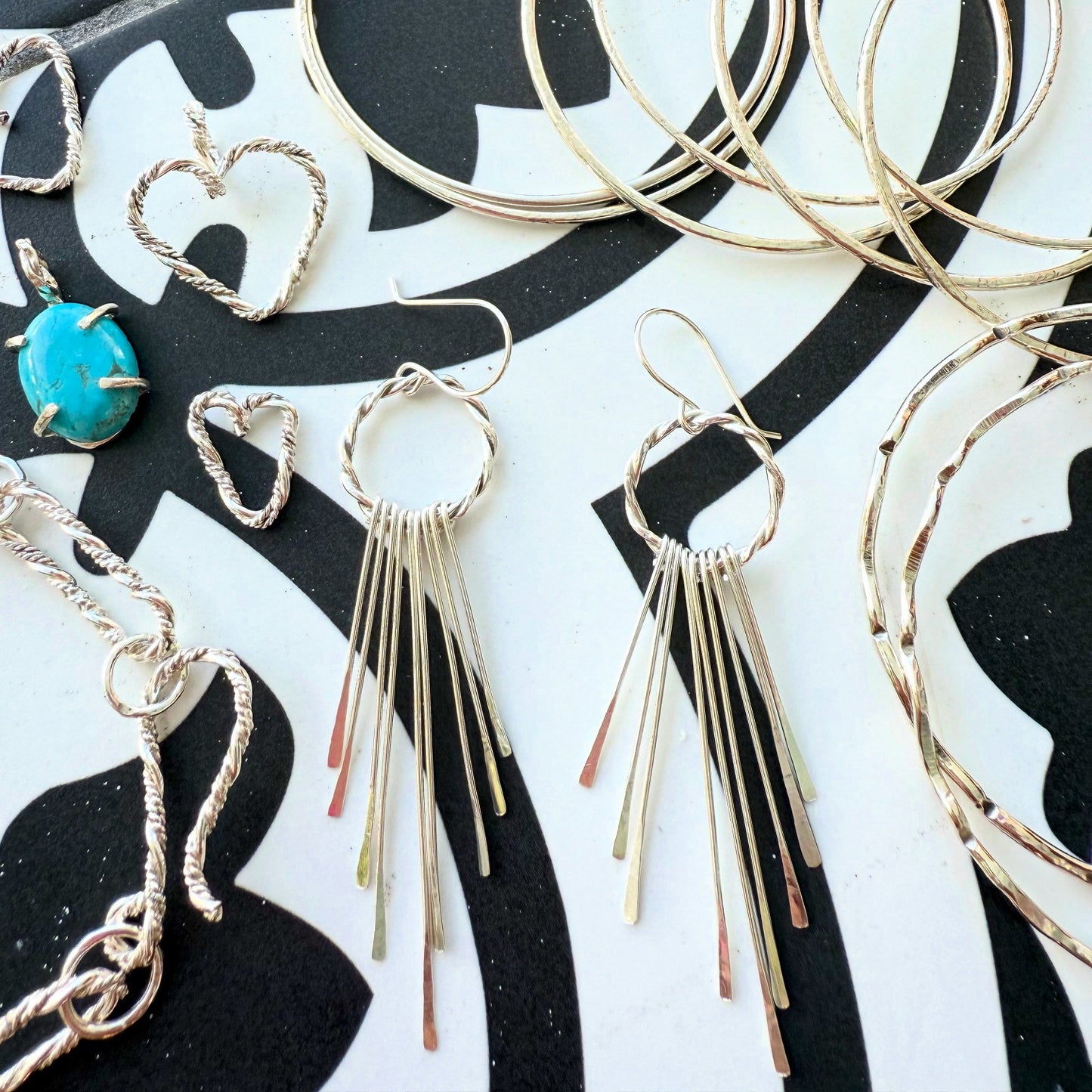 Shop our stunning tassel earrings silver, designed to add elegance and flair to your look. Browse our collection and find the perfect pair for you.