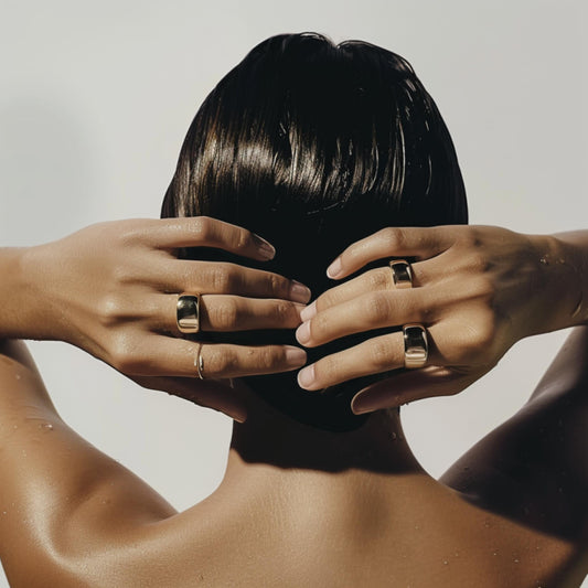woman wearing minimalist jewelry