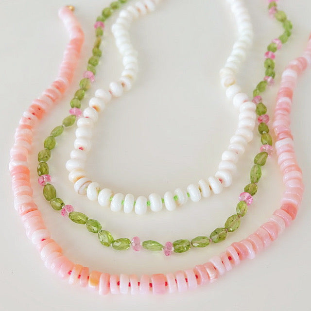 Display of candy necklaces in a kaleidoscope of colors and beautiful gemstones