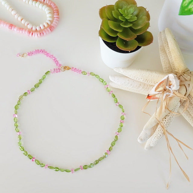Display of August birthstone jewelry of peridot