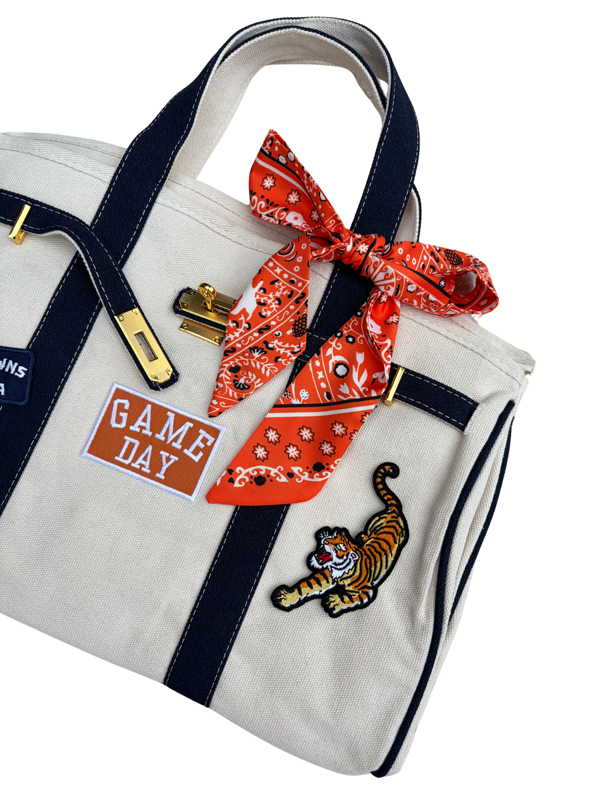 Auburn College Football Tote Bag in premium cream white canvas with navy blue trim, custom Tigers patches, and an orange twilly scarf.