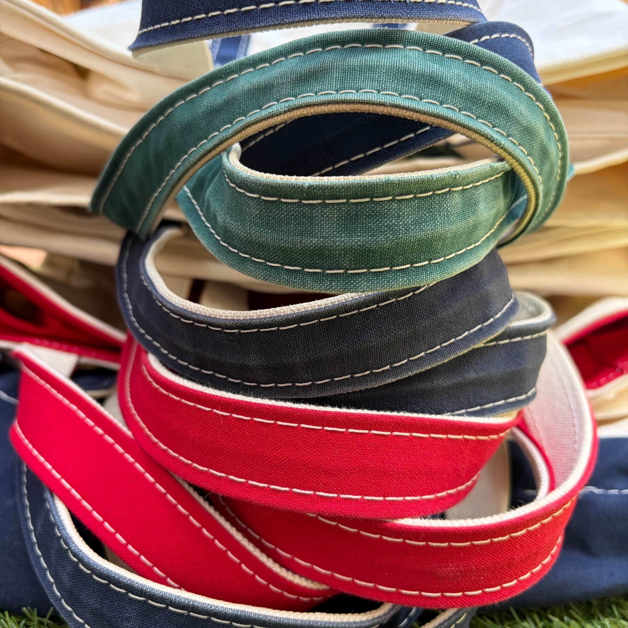 Stack of vintage L.L. Bean Tote bags