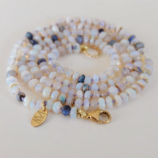 14k gold Australian Opal bead necklace, elegantly displayed on a flat surface.