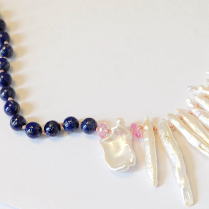Close-up of Japanese Biwa pearls on a lapis lazuli necklace