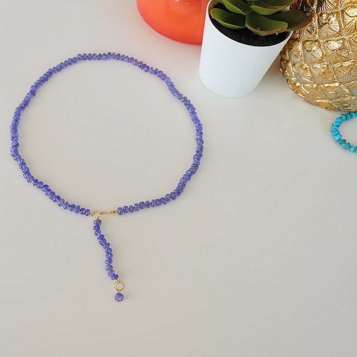 Full strand of a beaded tanzanite bead necklace in 14K gold