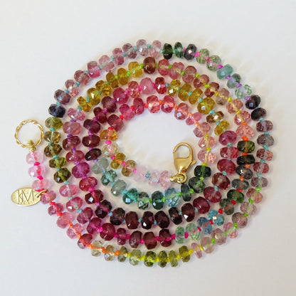 Hand-knotted 14K gold watermelon tourmaline candy necklace with pink and green gemstones.