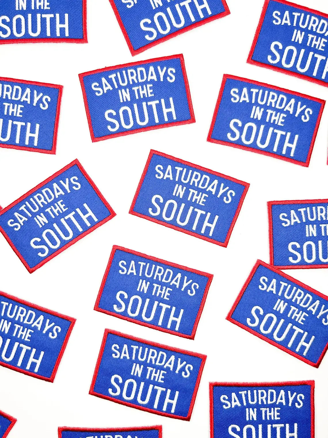 Pattern of 'Saturdays in the South' patches on a white background