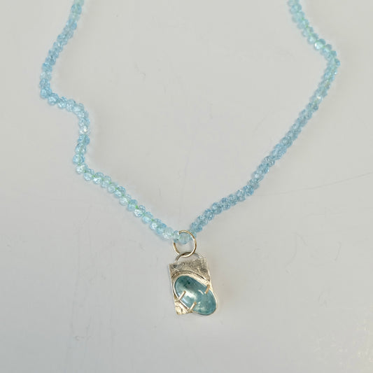 Aquamarine Charm Necklace in 14K gold with AAA aquamarine beads and removable charm.