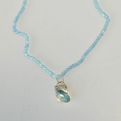 Aquamarine Charm Necklace in 14K gold with AAA aquamarine beads and removable charm.