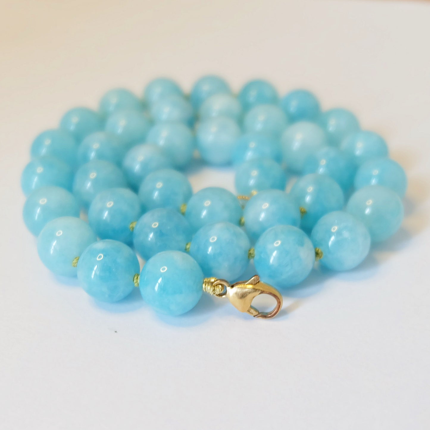 Aquamarine bead necklace with gold clasp