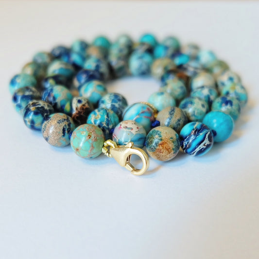 blue bead candy necklace with gold clasp