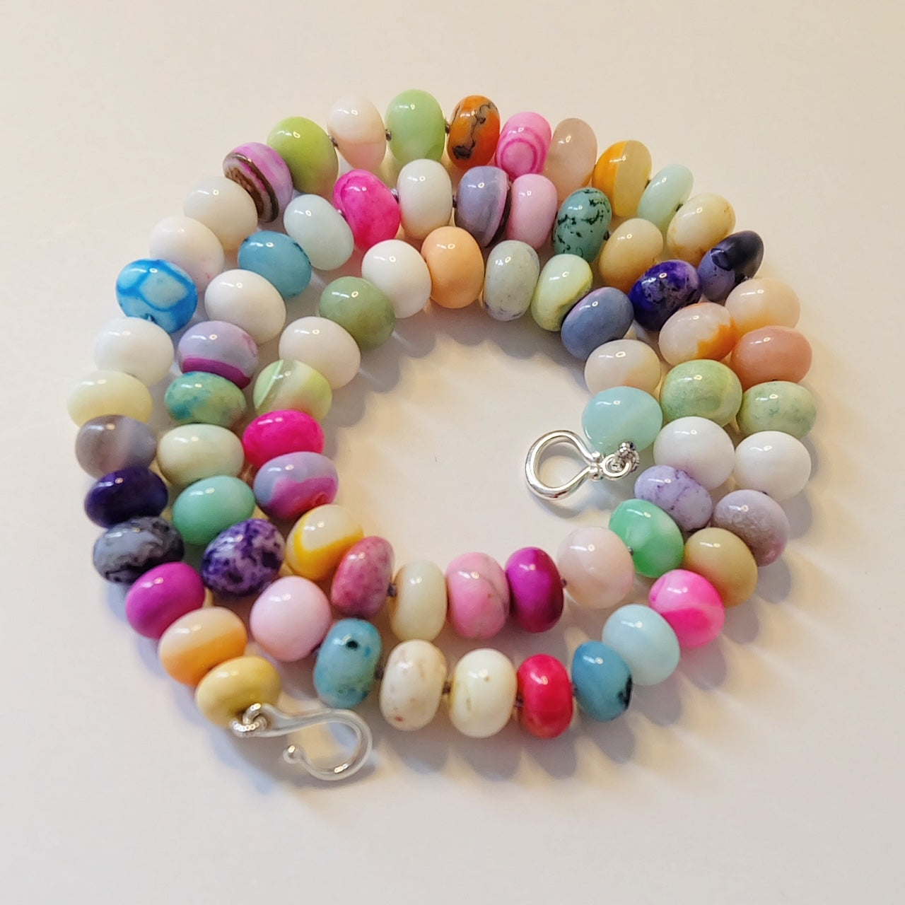 A collection of beautifully crafted candy and gemstone necklaces