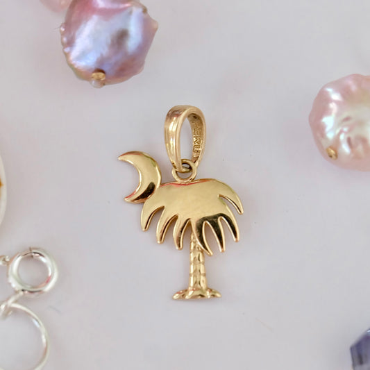 14K Gold Charleston Charm showcasing the Palmetto and Moon symbol, a timeless keepsake of Charleston's heritage.