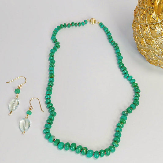 Elegant 14K gold necklace featuring beautiful chrysoprase beads, perfect for adding a touch of sophistication to any outfit.