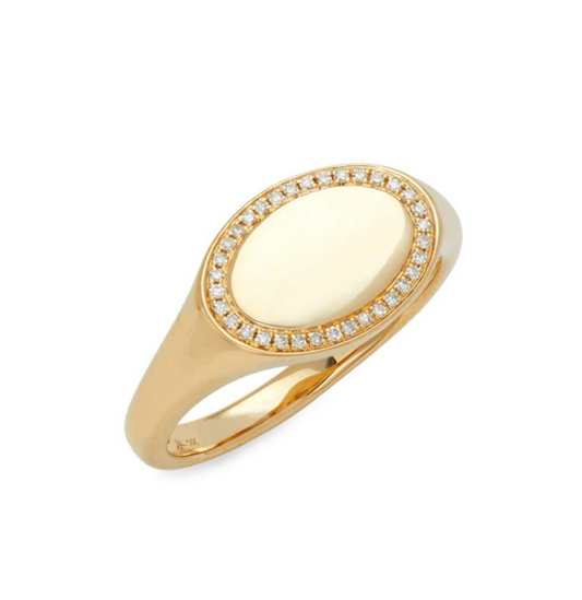 A polished diamond signet ring featuring a sleek design, perfect for adding elegance to any outfit.