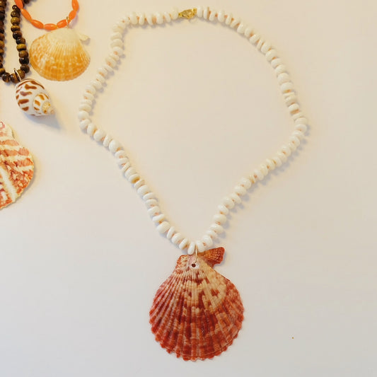  A seashell necklace crafted during a jewelry class in Key Largo, showcasing unique designs and vibrant colors.