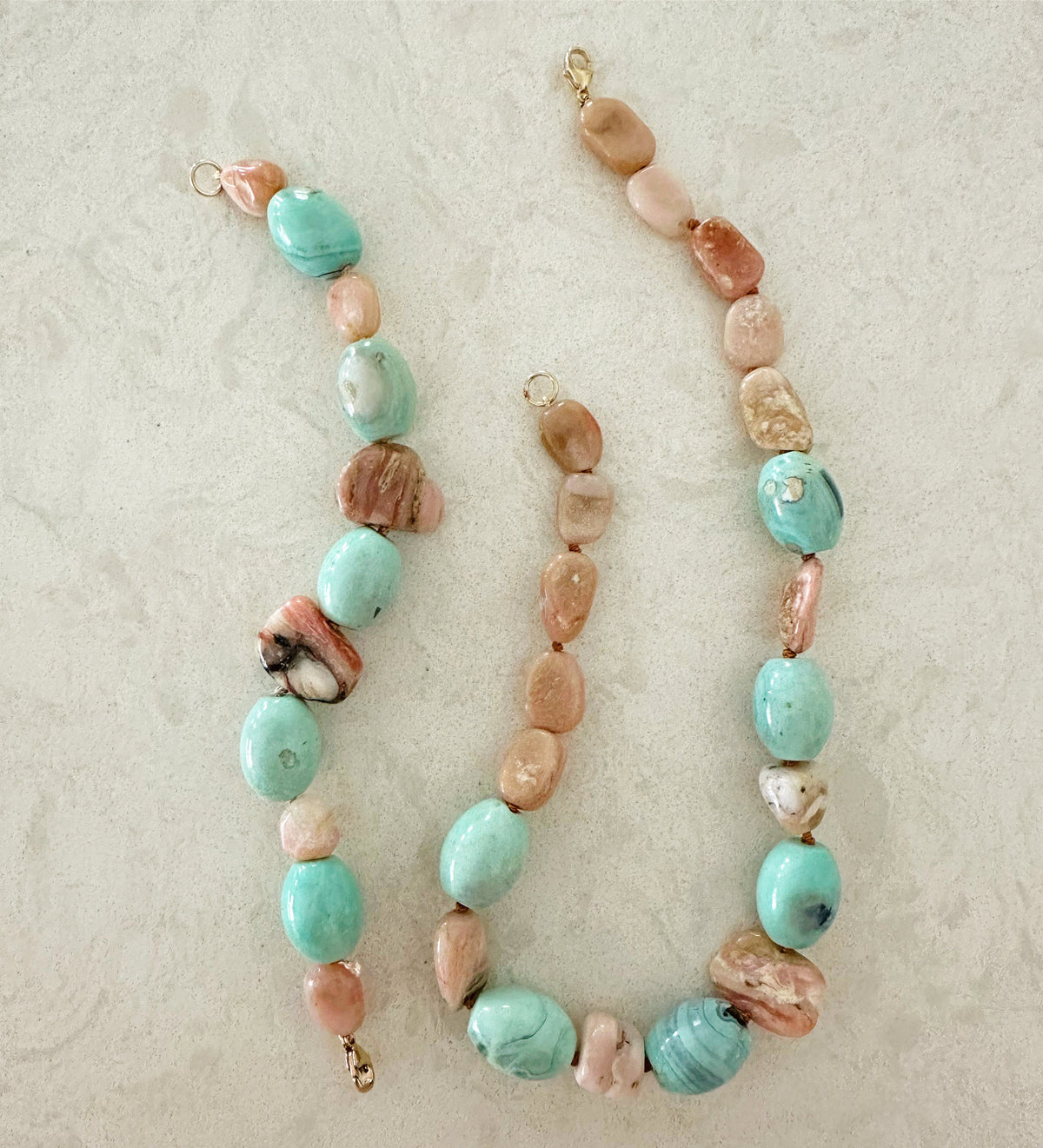 Pink Peruvian opal and agate beads on a handmade bead bracelet