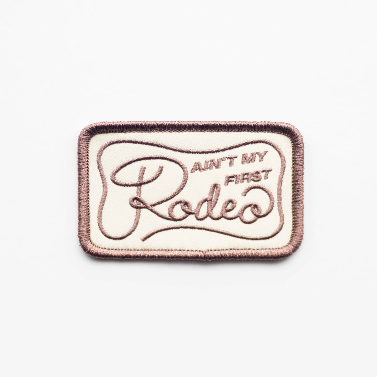 Ain't My First Rodeo embroidered iron-on patch in brown and cream