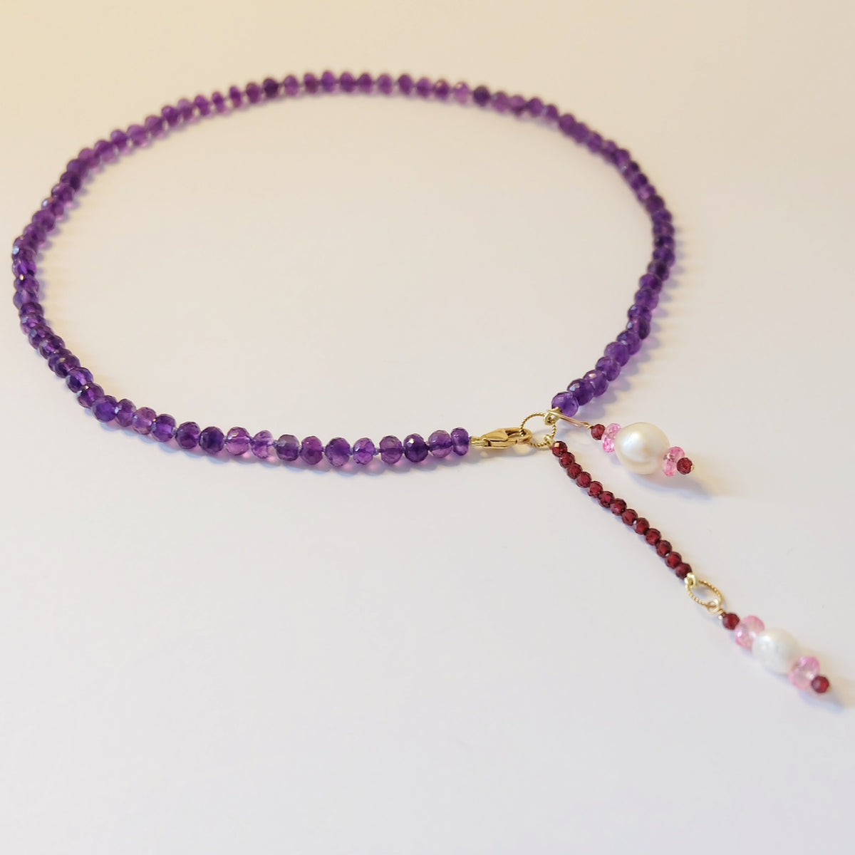 Amethyst necklace with pearl and topaz charms