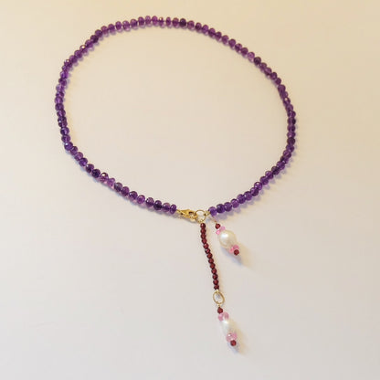 Hand-knotted amethyst bead necklace with gemstone charm extender