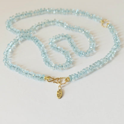 Full view of hand-knotted aquamarine necklace with solid 14K gold clasp.