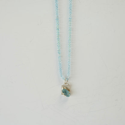 Aquamarine charm candy necklace styled with a simple outfit