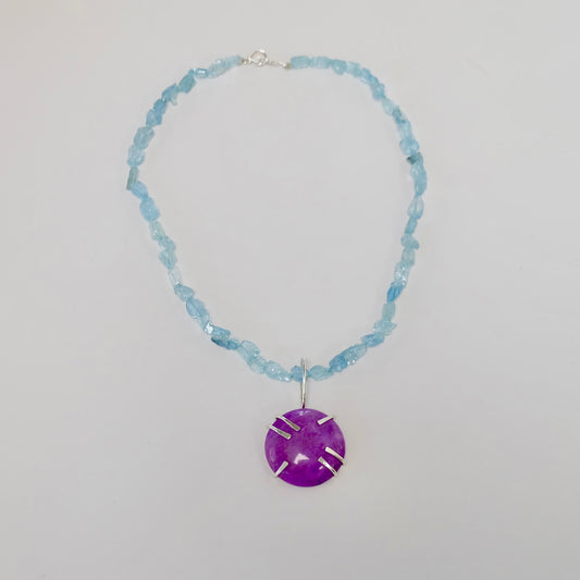Vibrant aquamarine necklace with purple sugilite pendant