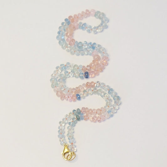 Aquamarine Rose Quartz Candy Necklace hand-knotted on silk with 14K gold-filled clasp, featuring pastel gemstone beads in soft blue and blush pink tones.