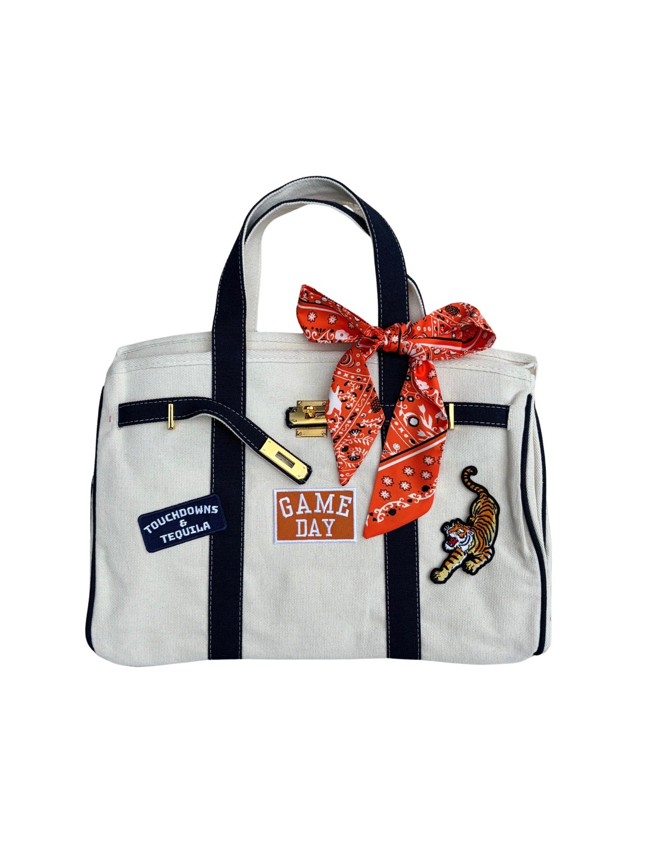 Auburn college football tote bag featuring an orange twilly scarf, gold lock, and custom Auburn Tiger patches.