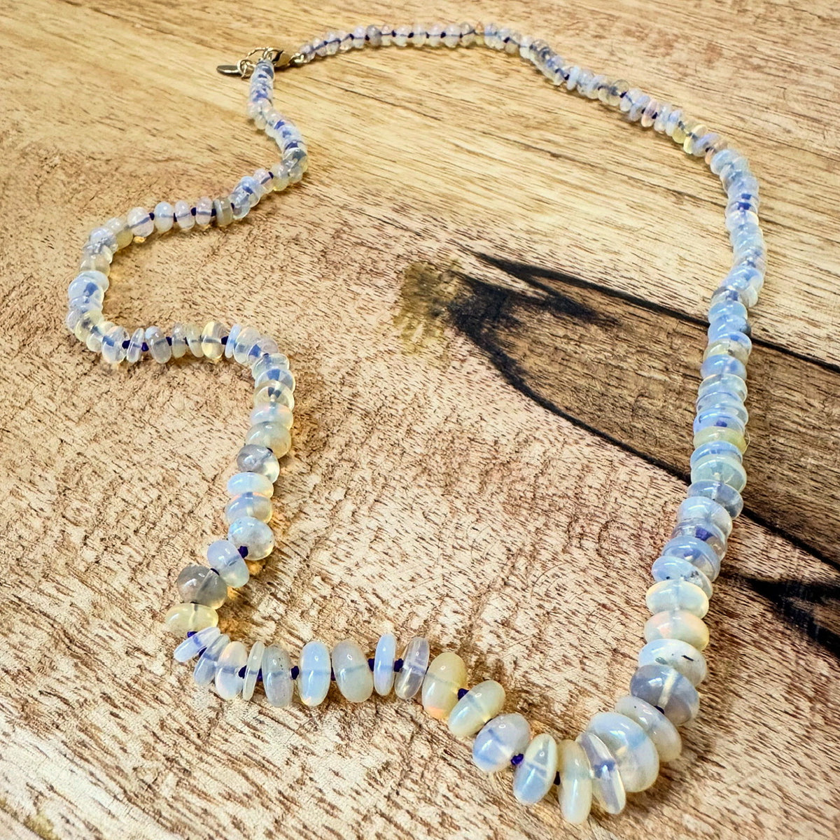 Close-up of Coober Pedy Australian opal beads with play of color