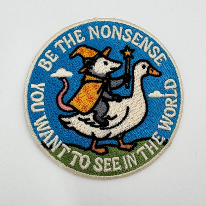 Be the Nonsense You Want to See in the World patch with a wizard opossum riding a goose