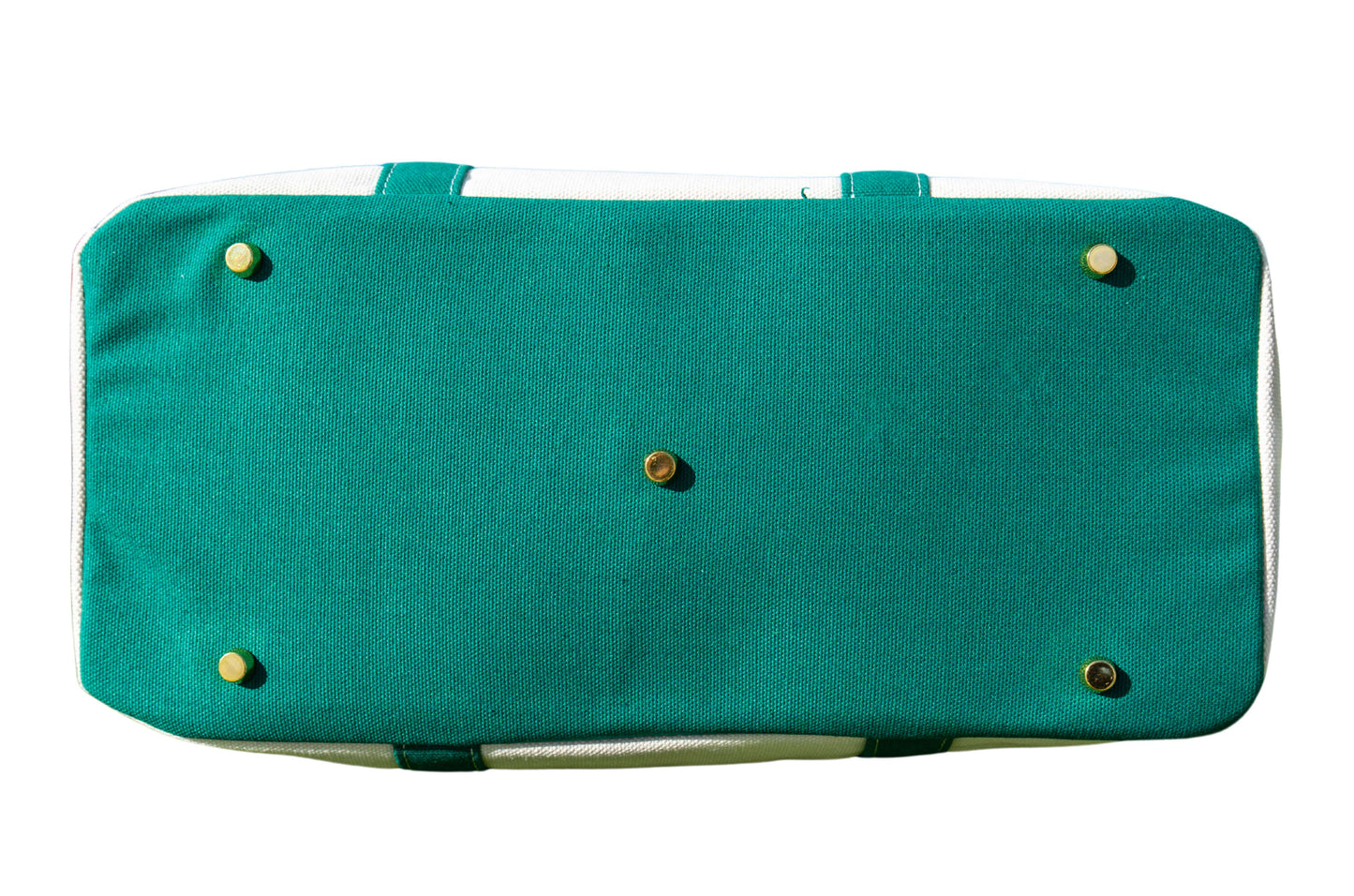 Green Boatkin bag bottom with gold feet. 