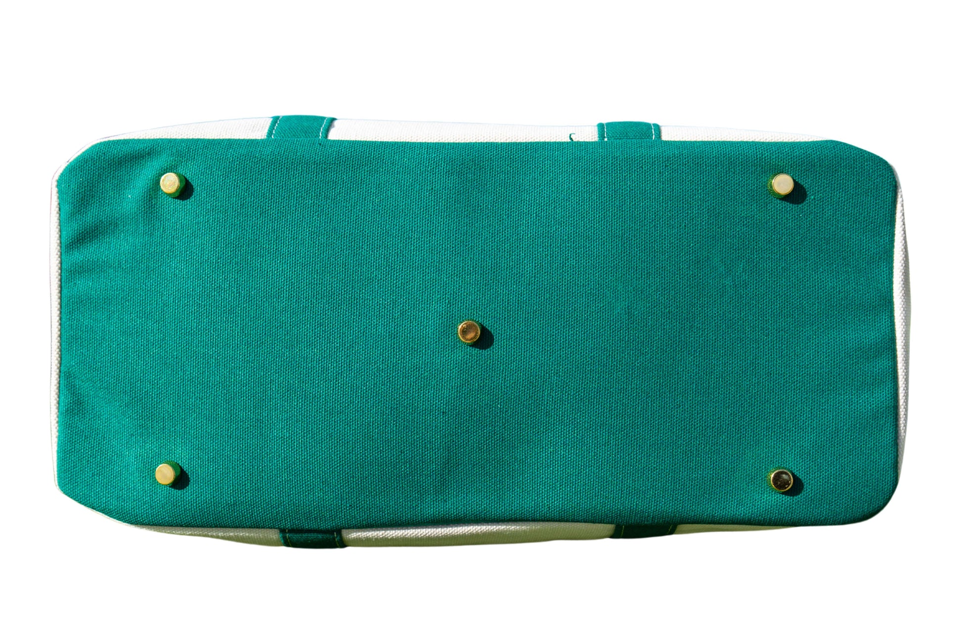 Green Boatkin bag bottom with gold feet. 