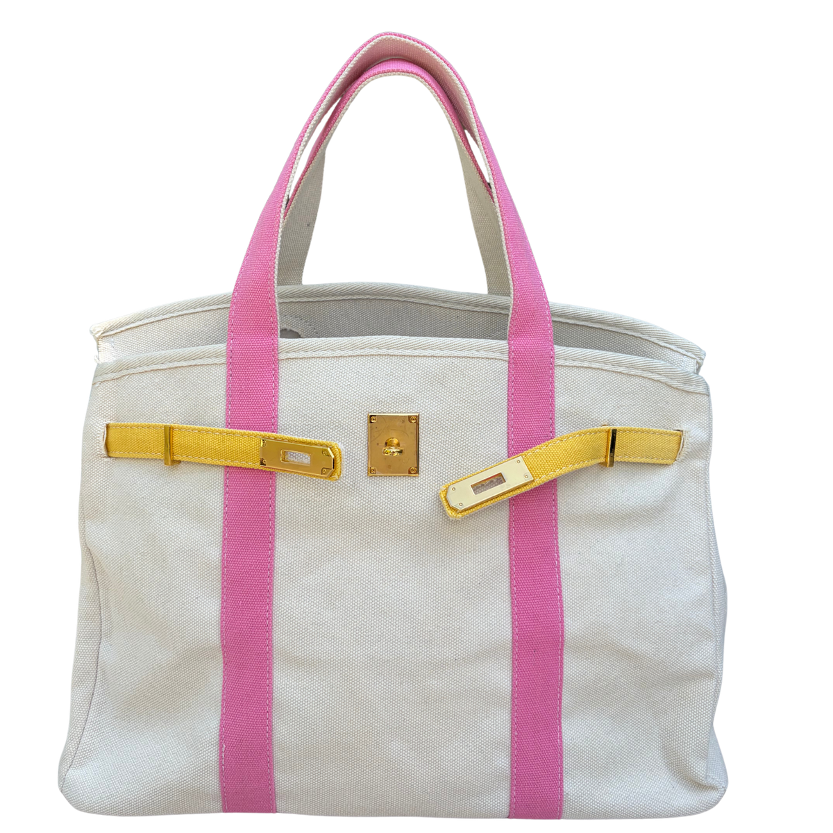 Pink and yellow Boatkin bag on white background 