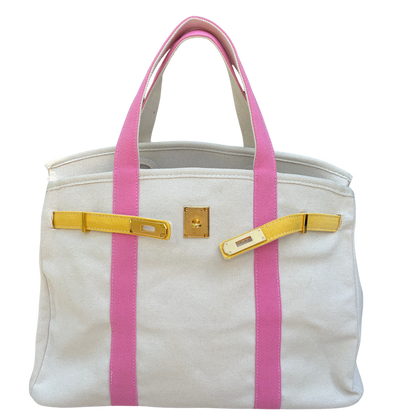 Pink and yellow Boatkin bag on white background 