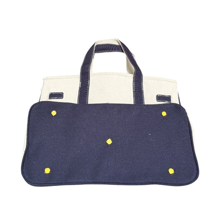 Navy blue Boatkin bag bottom with gold feet