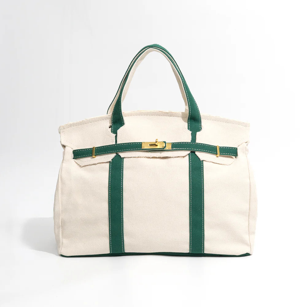 Boatkin tote bag with green straps on a white background
