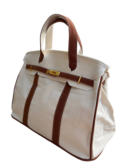 Brown Boatkin bag piping on a white background