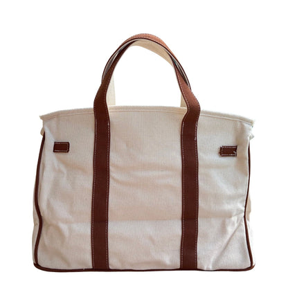 Brown Boatkin bag back on a white background