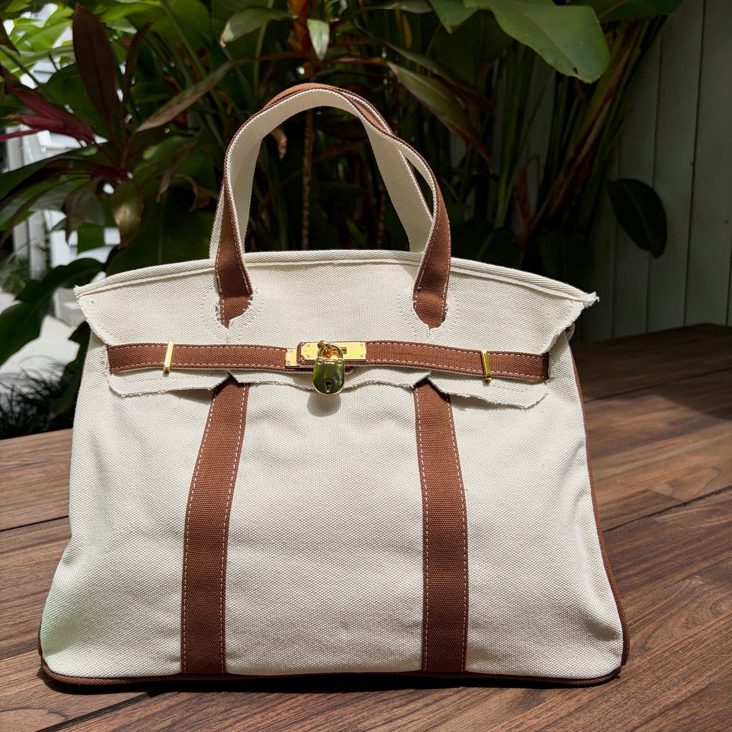 Brown Boatkin bag with lock 