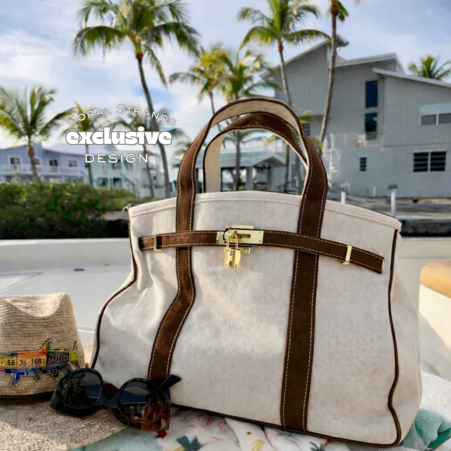 Brown Boatkin on a boat deck with palm trees and houses in the background.
