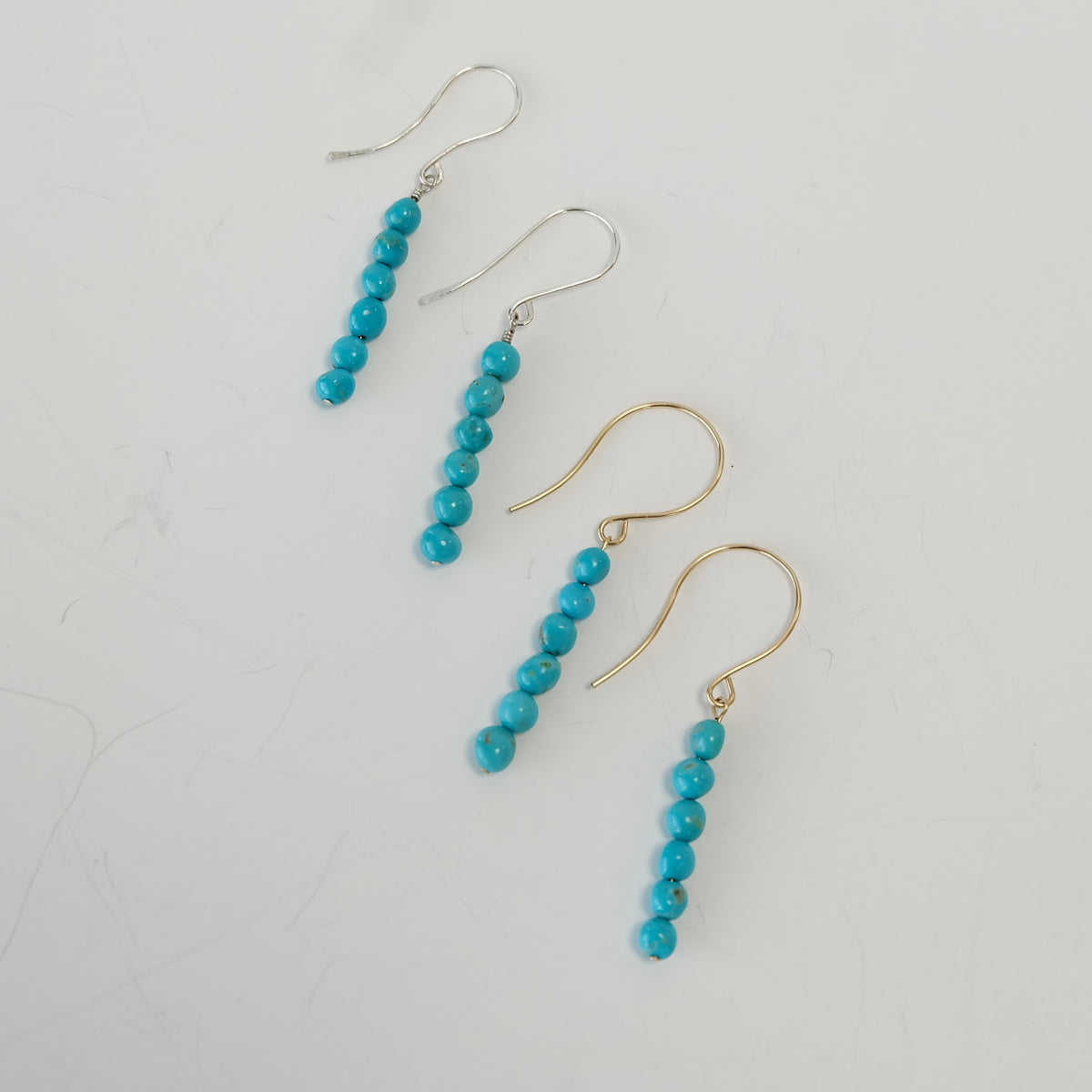 Campitos turquoise dangle earrings in sterling silver and 14K gold