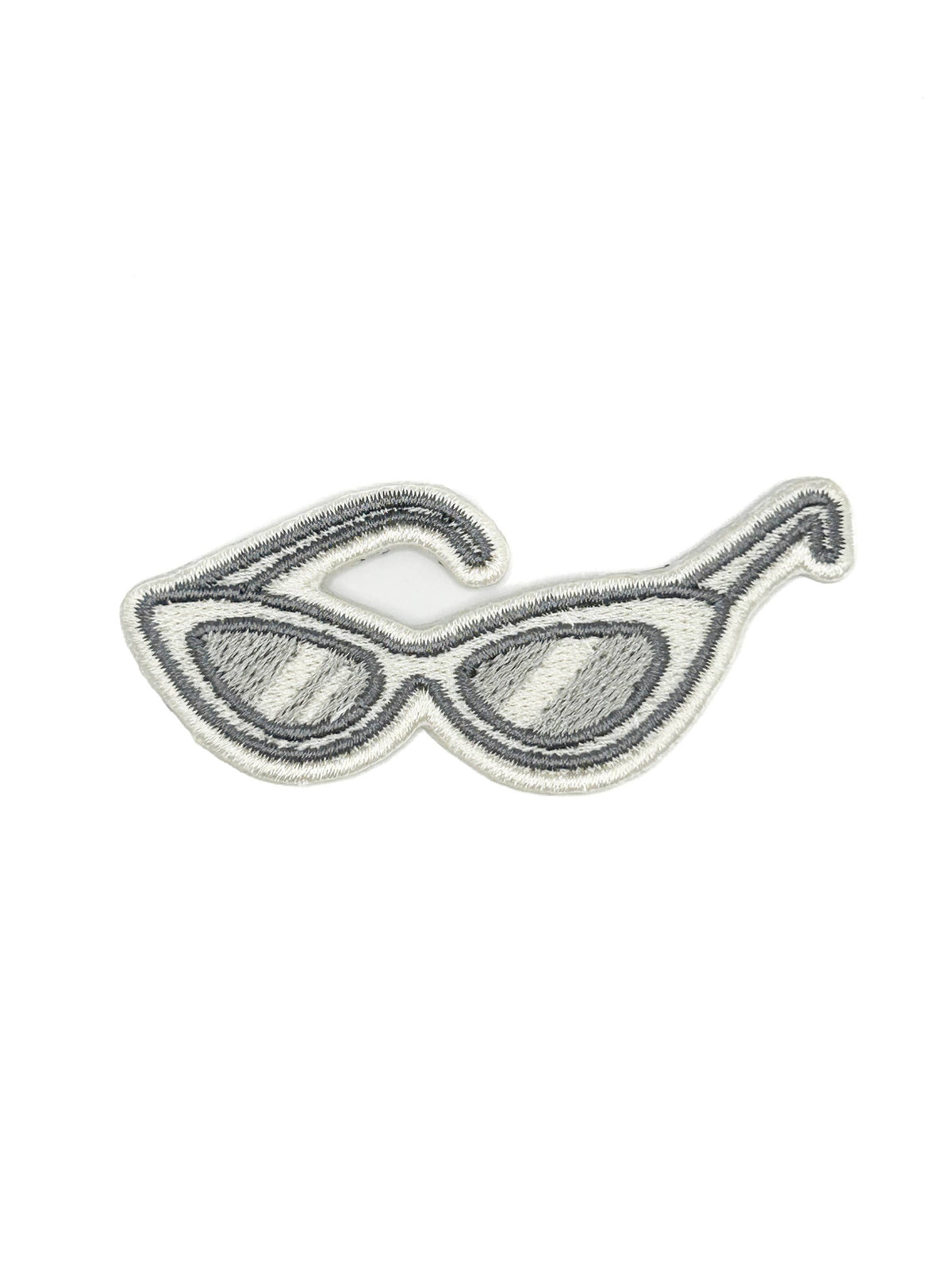 Embroidered iron-on patch of retro cat eye sunglasses in neutral tones